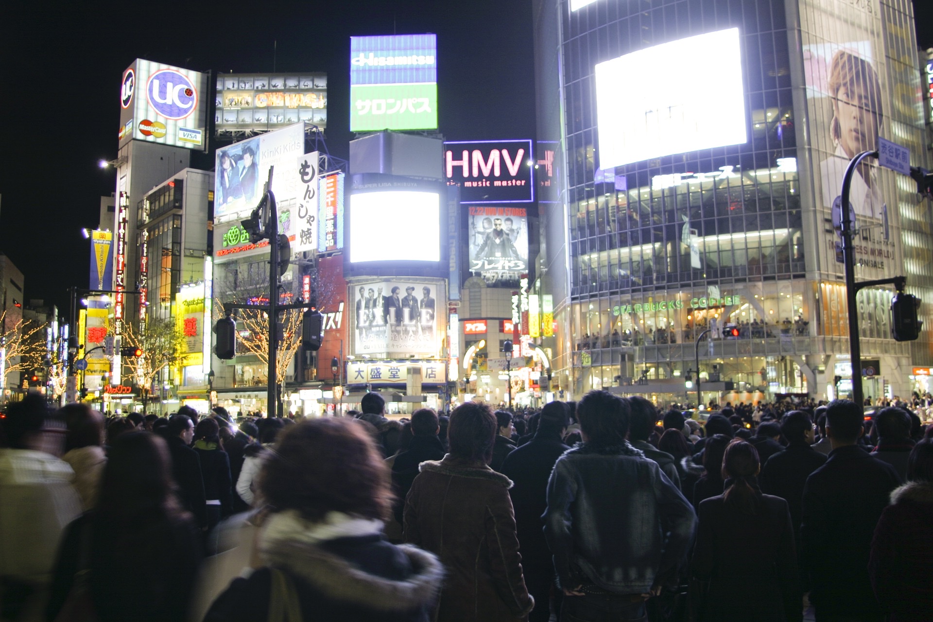 Tokyo Shinjuku neon illuminated street with bullet train transit